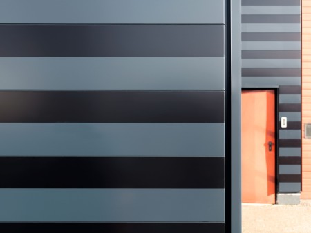 Steel’s got style: pladur® with stripe pattern on facade Steel’s got style: pladur® with stripe pattern on facade