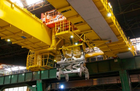 Intelligent logistics control in the new fully automated slab stockyard: 1.7 million tons of slabs per year will be moved here for the new hot strip mill 4. Danieli will supply four fully automatic slab cranes and undertake the construction and installation of the complete structural steelwork. Intelligent logistics control in the new fully automated slab stockyard: 1.7 million tons of slabs per year will be moved here for the new hot strip mill 4. Danieli will supply four fully automatic slab cranes and undertake the construction and installation of the complete structural steelwork.