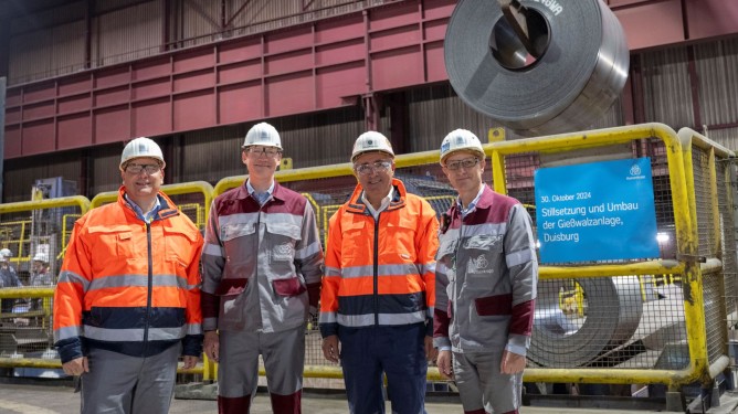 From left to right: Andy Rohe (Head of Downstream Operations), Dennis Grimm (Spokesman of the Executive Board), Ali Güzel (Chairman of the Works Council thyssenkrupp Steel), Michael Bössler (Head of GWA) From left to right: Andy Rohe (Head of Downstream Operations), Dennis Grimm (Spokesman of the Executive Board), Ali Güzel (Chairman of the Works Council thyssenkrupp Steel), Michael Bössler (Head of GWA)