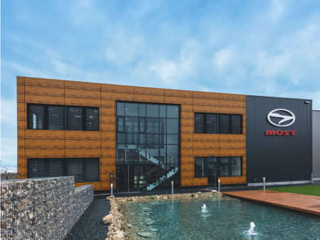 Facade made of pladur® Relief Wood at MOST Mobile Facade made of pladur® Relief Wood at MOST Mobile