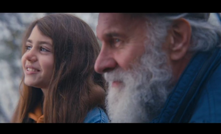Grandpa and granddaughter talking
