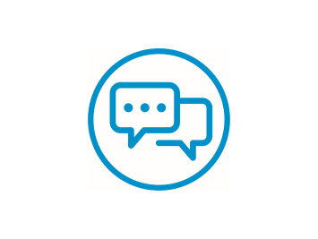 Blue icon showing two speech bubbles inside a circle, one with three dots – symbolizing networking and exchange. Blue icon showing two speech bubbles inside a circle, one with three dots – symbolizing networking and exchange.