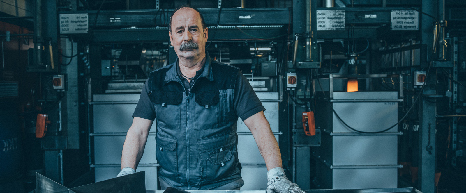 Employee in protective clothing in an industrial environment at thyssenkrupp Steel. Employee in protective clothing in an industrial environment at thyssenkrupp Steel.